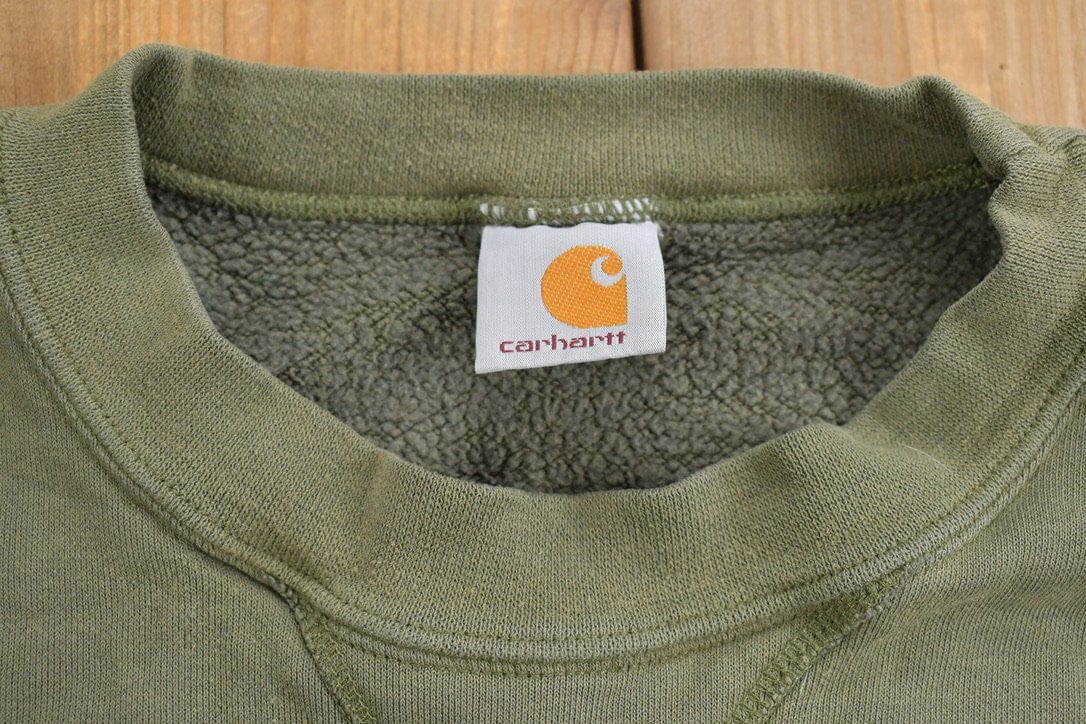 Vintage 1990s Carhartt Blank Green Crewneck Sweatshirt Men's Large from propervintagecanada