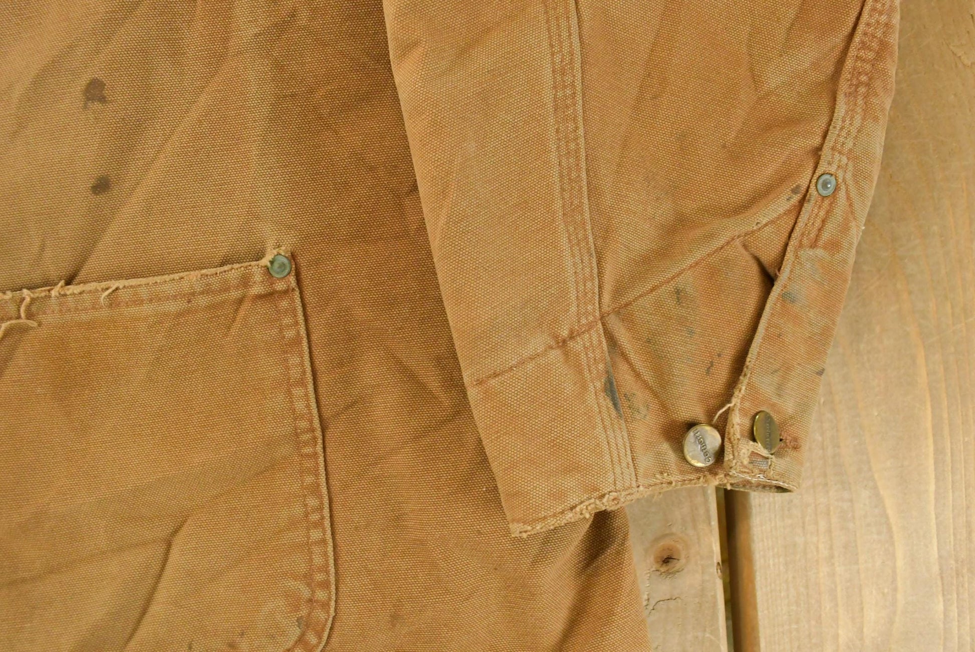 Vintage 1990s Carhartt Blanket Lined Button Up Chore Coat Men's XL from propervintagecanada