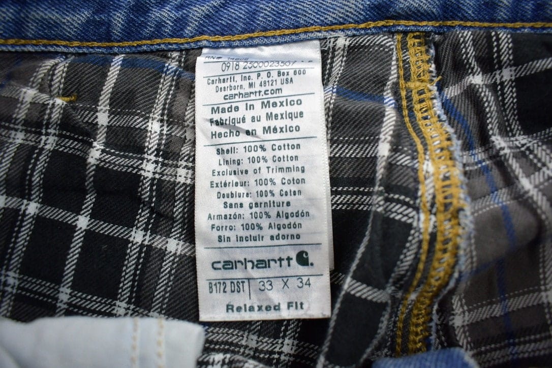 Vintage 1990s Carhartt Blanket Lined Work Pants Men's 33 x 34 from propervintagecanada