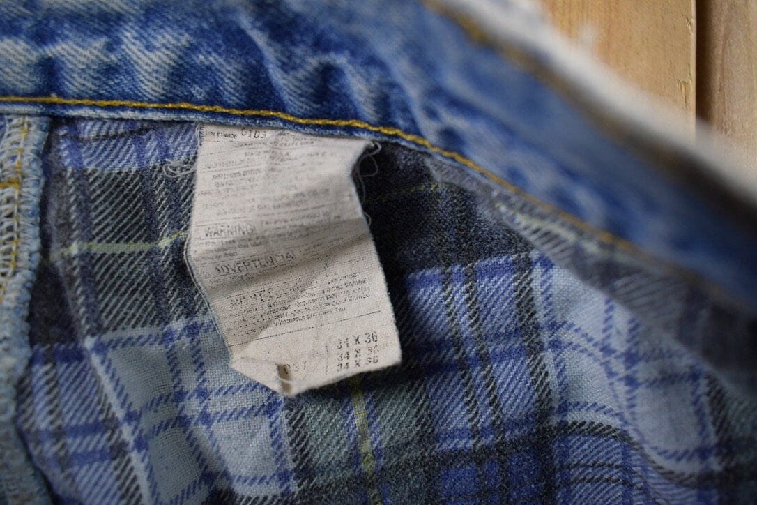 Vintage 1990s Carhartt Blanket Lined Work Pants Men's 34 x 36 from propervintagecanada