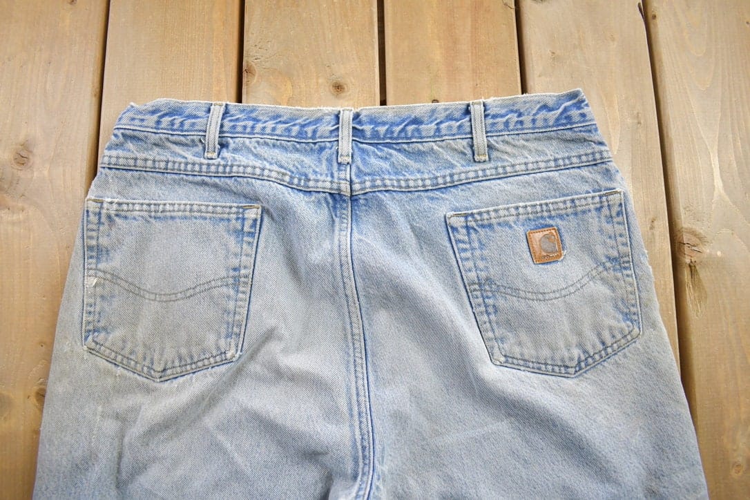 Vintage 1990s Carhartt Blanket Lined Work Pants Men's 38 x 32 from propervintagecanada