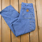 Vintage 1990s Carhartt Blue Denim Work Pants Men's 33 x 28 from propervintagecanada