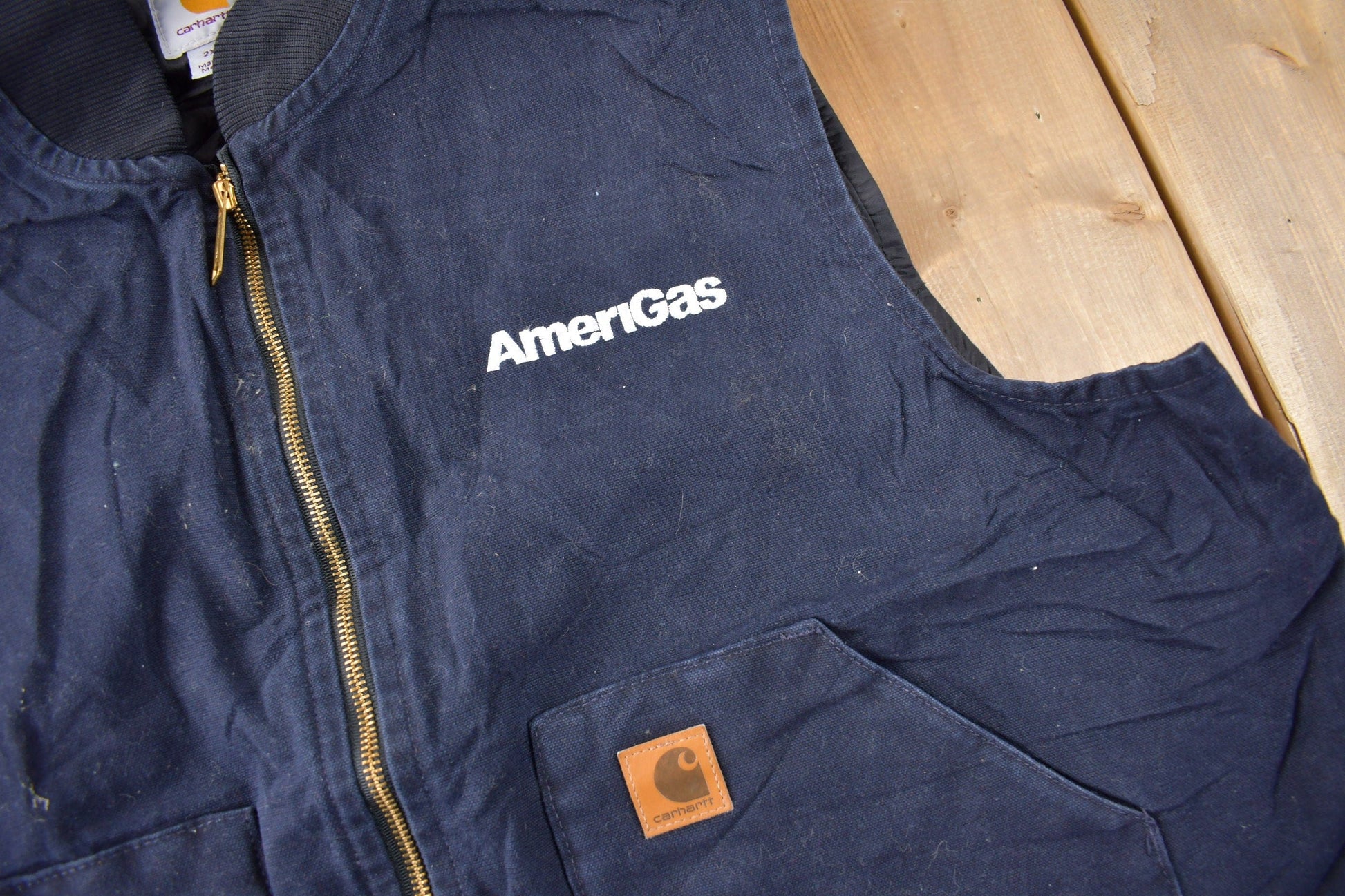 Vintage 1990s Carhartt Blue Embroidered Quilted Work Vest Men's 2XL from propervintagecanada