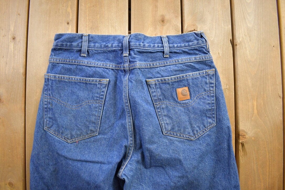 Vintage 1990s Carhartt Blue Jeans Men's 32 x 32 from propervintagecanada
