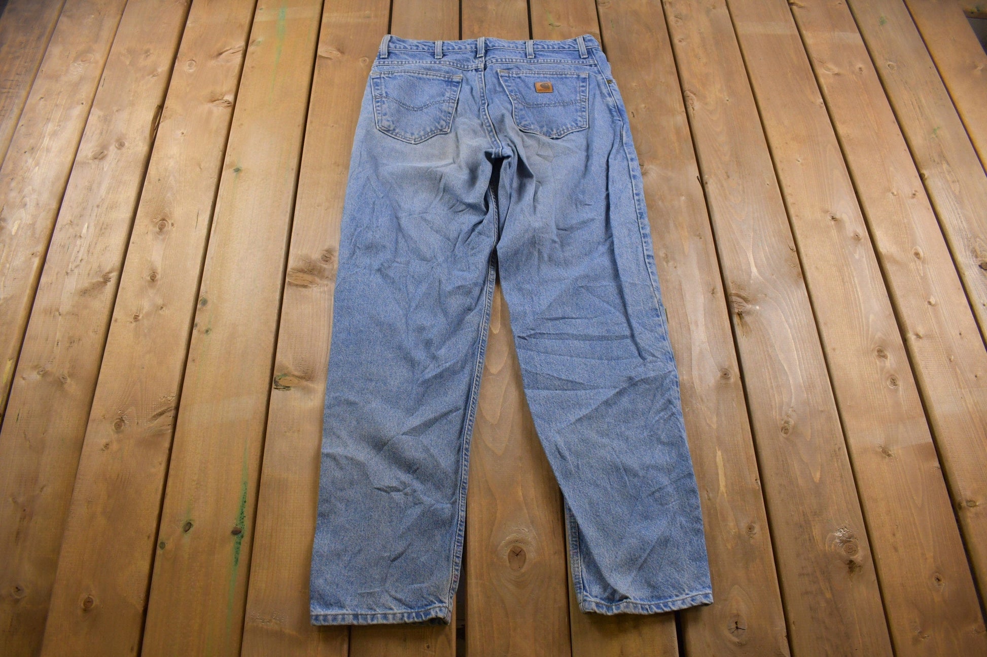 Vintage 1990s Carhartt Blue Jeans Men's 34 x 31 from propervintagecanada