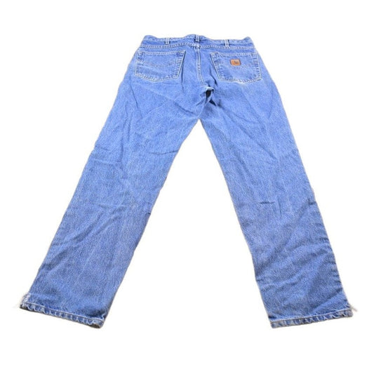 Vintage 1990s Carhartt Blue Work Jeans Men's 32 x 33 from propervintagecanada