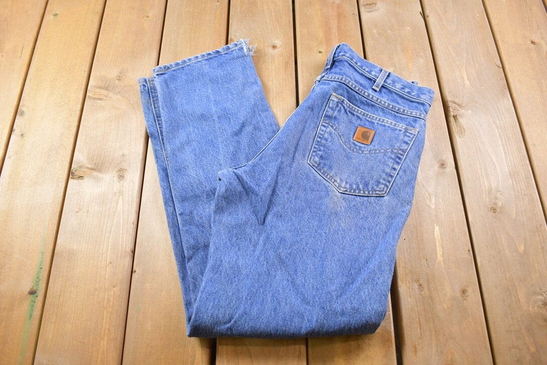 Vintage 1990s Carhartt Blue Work Jeans Men's 32 x 33 from propervintagecanada