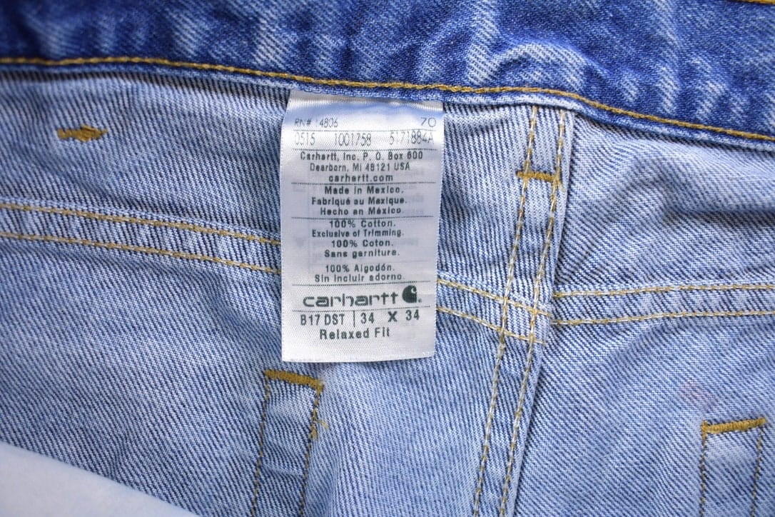 Vintage 1990s Carhartt Blue Work Jeans Men's 32 x 33 from propervintagecanada