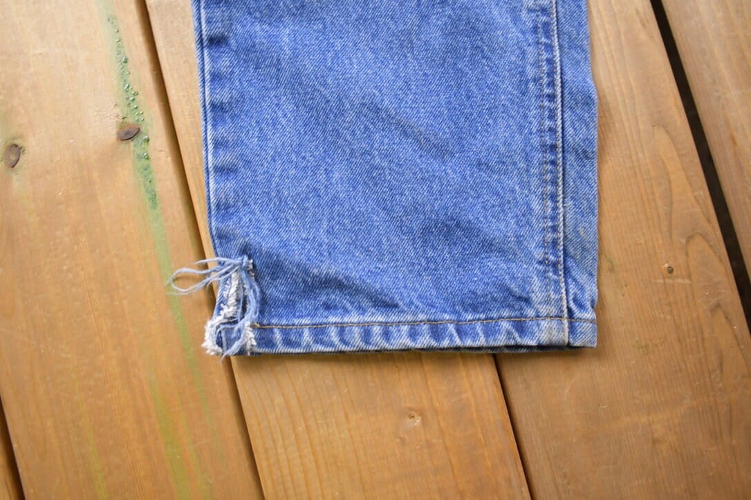 Vintage 1990s Carhartt Blue Work Jeans Men's 32 x 33 from propervintagecanada