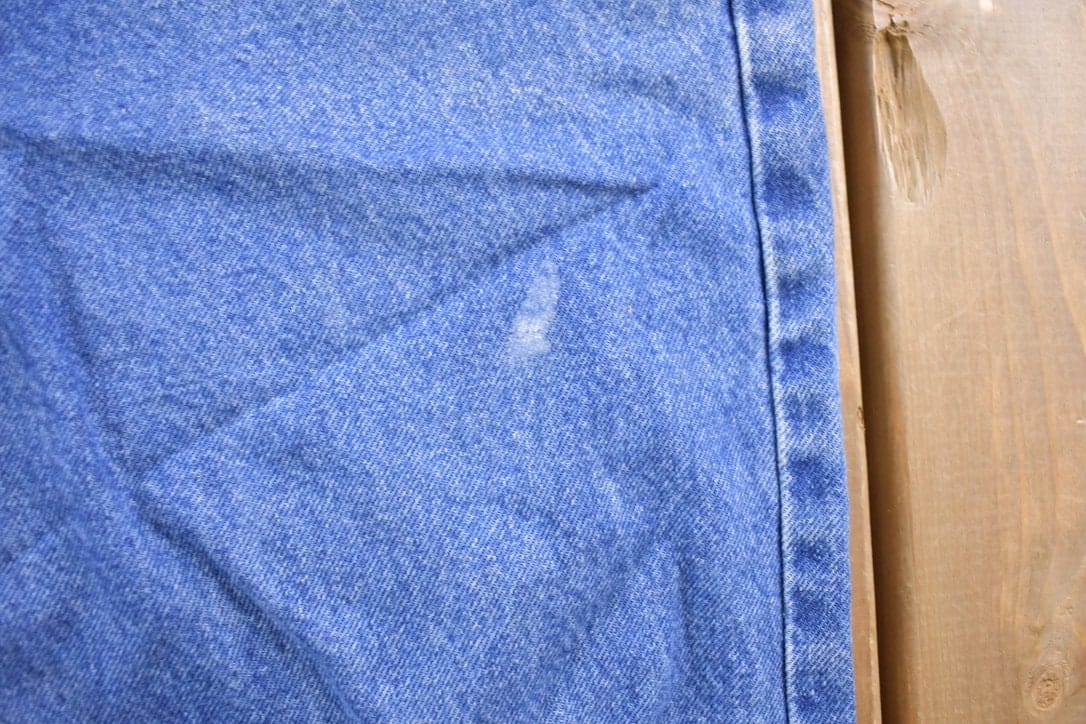 Vintage 1990s Carhartt Blue Work Jeans Men's 32 x 33 from propervintagecanada