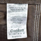 Vintage 1990s Carhartt Brown Denim Work Pants Men's 38 x 30 from propervintagecanada