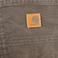 Vintage 1990s Carhartt Brown Denim Work Pants Men's 38 x 30 from propervintagecanada