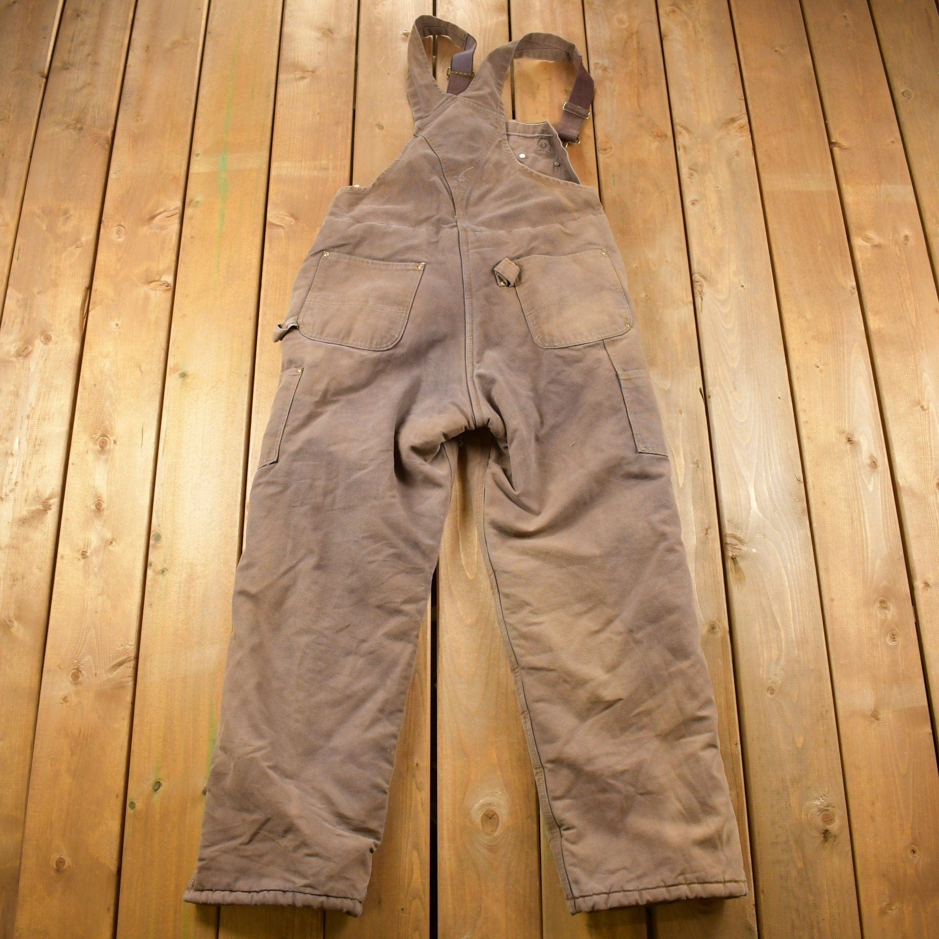 Vintage 1990s Carhartt Brown Double Knee Canvas Quilted Overalls Men's 36 x 28 from propervintagecanada