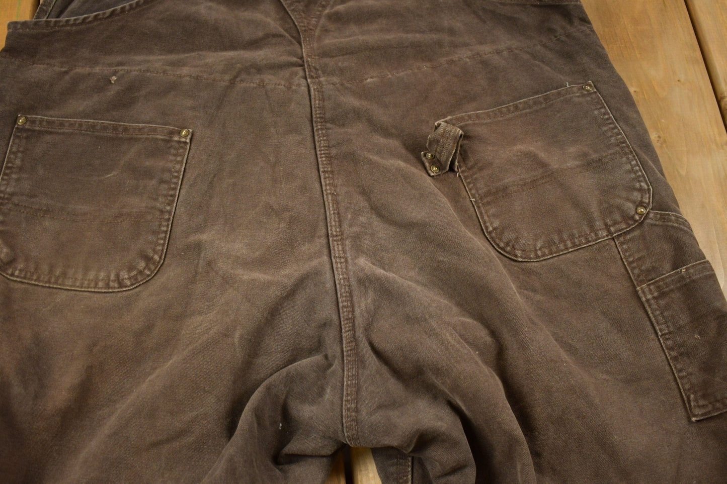 Vintage 1990s Carhartt Brown Double Knee Canvas Quilted Overalls Men's 48 x 30 from propervintagecanada
