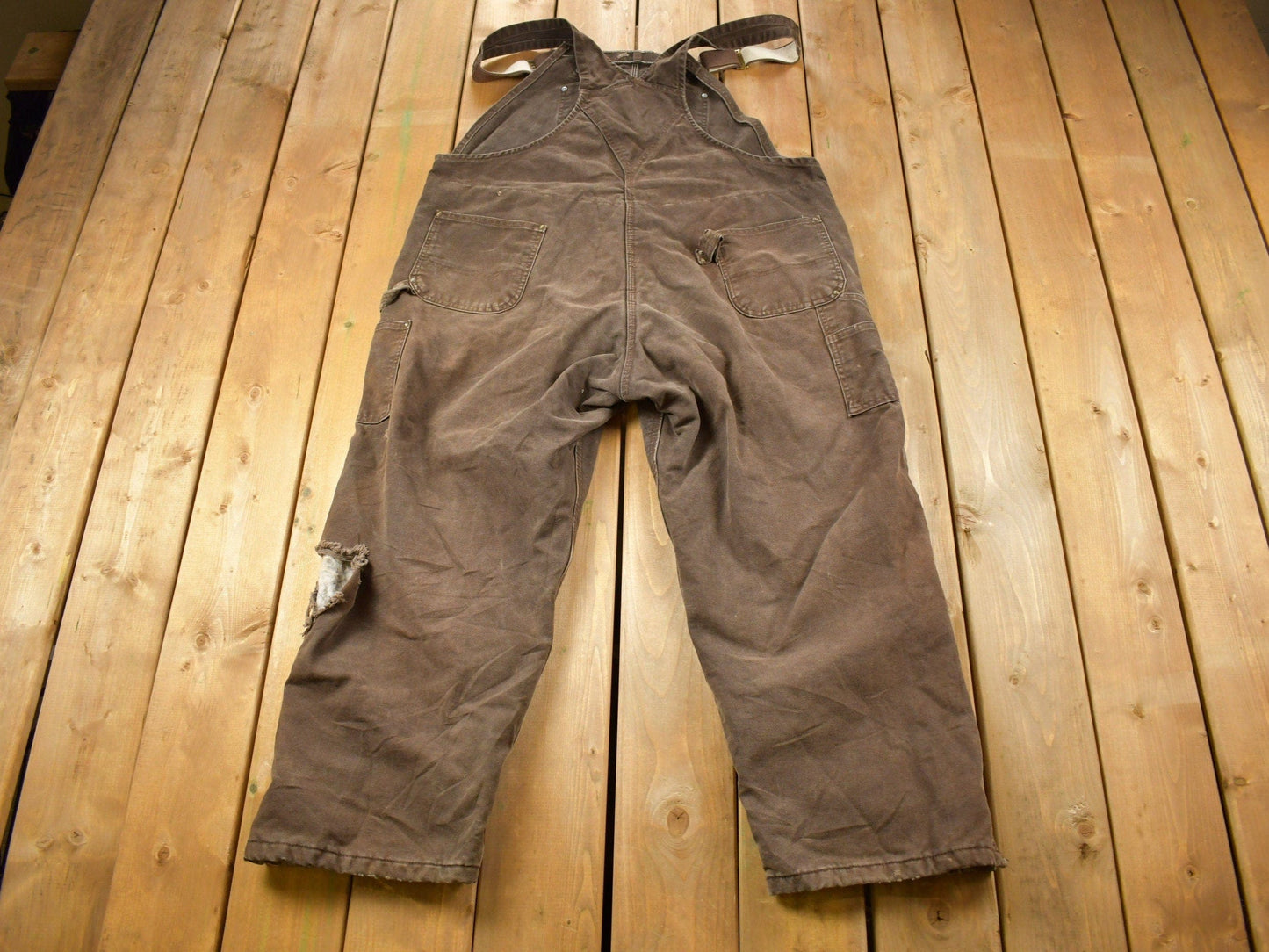 Vintage 1990s Carhartt Brown Double Knee Canvas Quilted Overalls Men's 48 x 30 from propervintagecanada