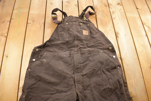 Vintage 1990s Carhartt Brown Double Knee Canvas Quilted Overalls Size 44 x 26 / Utility Overalls / Streetwear / Vintage Workwear from propervintagecanada