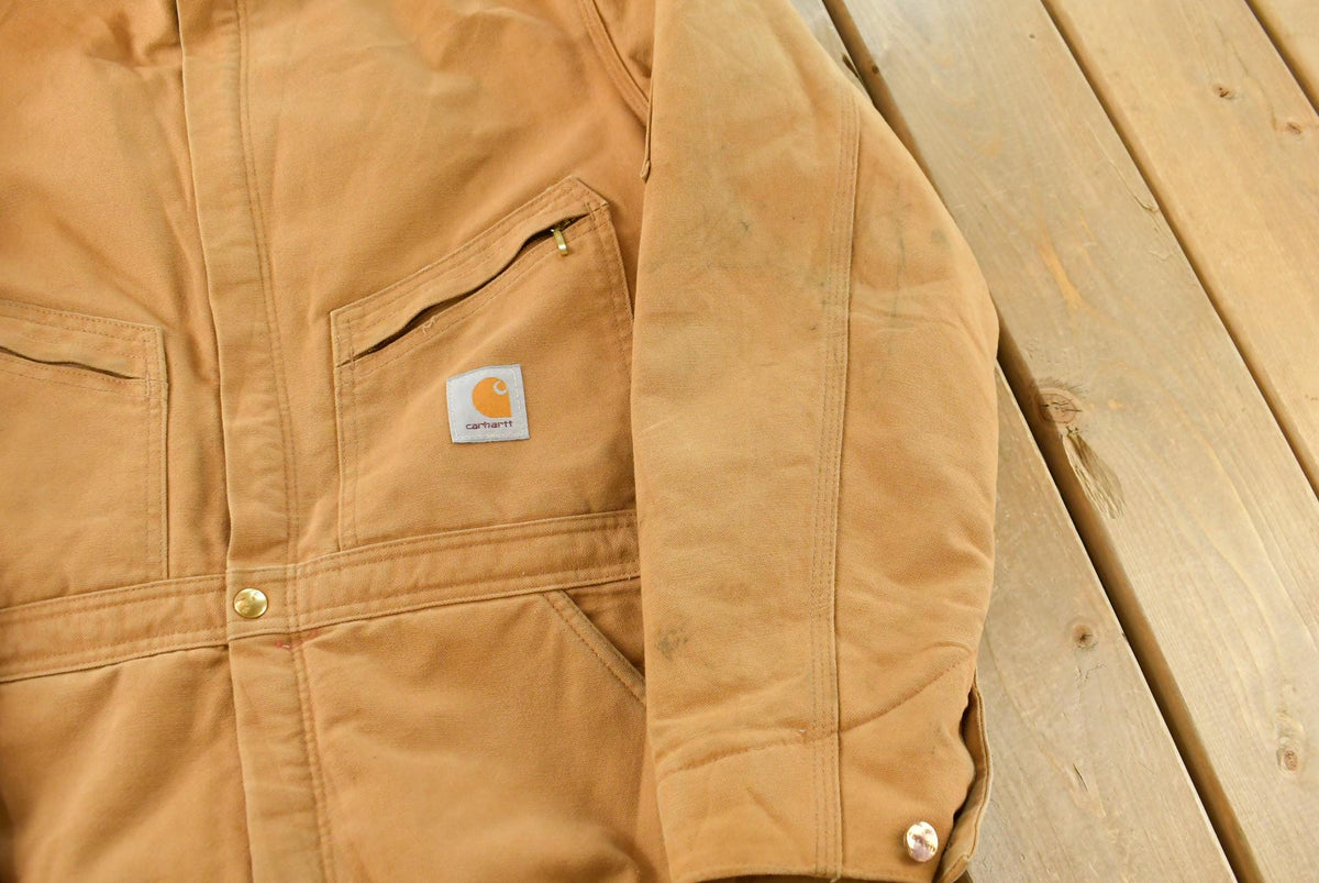 Vintage 1990s Carhartt Canvas Coveralls Men's 37 x 31 from propervintagecanada