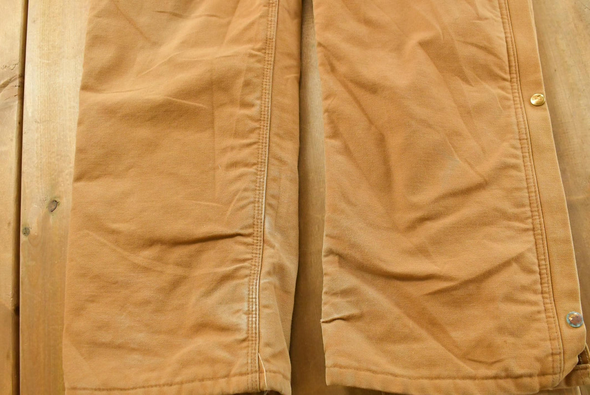 Vintage 1990s Carhartt Canvas Coveralls Men's 37 x 31 from propervintagecanada