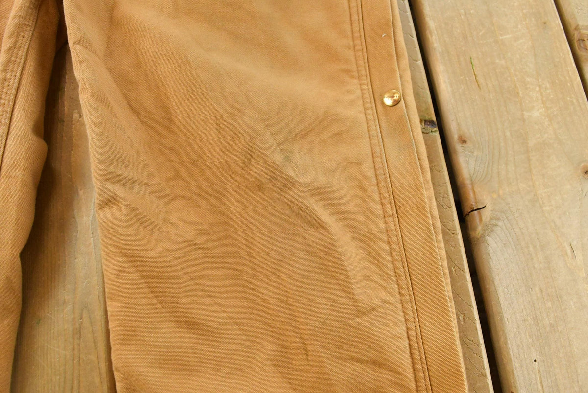 Vintage 1990s Carhartt Canvas Coveralls Men's 37 x 31 from propervintagecanada