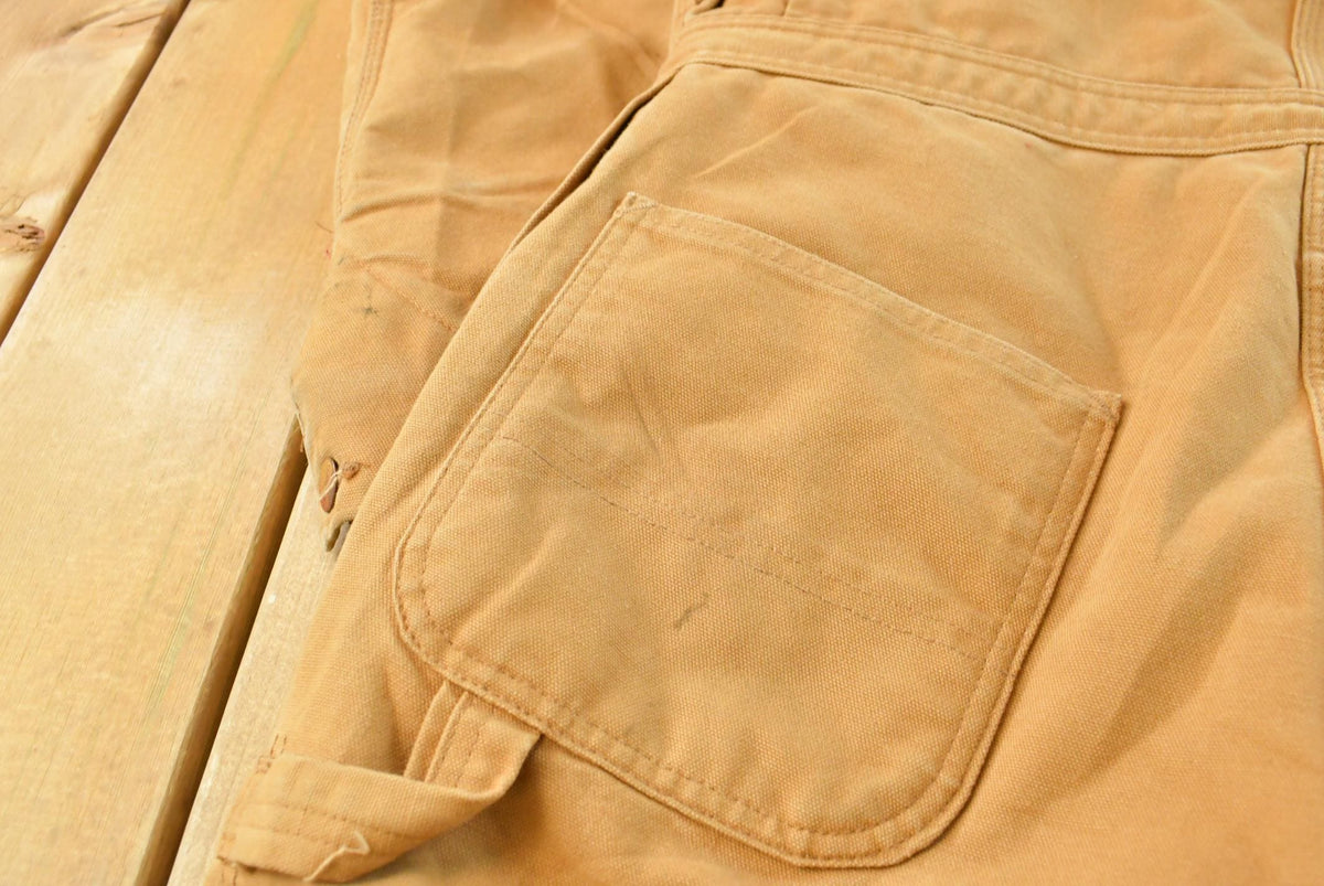 Vintage 1990s Carhartt Canvas Coveralls Men's 37 x 31 from propervintagecanada