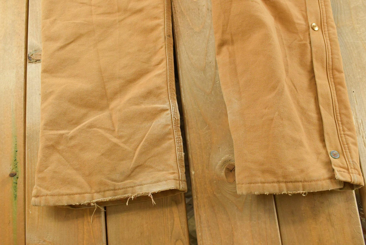 Vintage 1990s Carhartt Canvas Coveralls Men's 37 x 31 from propervintagecanada