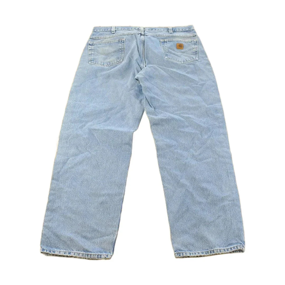 Vintage 1990s Carhartt Carpenter Distressed Denim Jeans Men's 38 x 32 from propervintagecanada