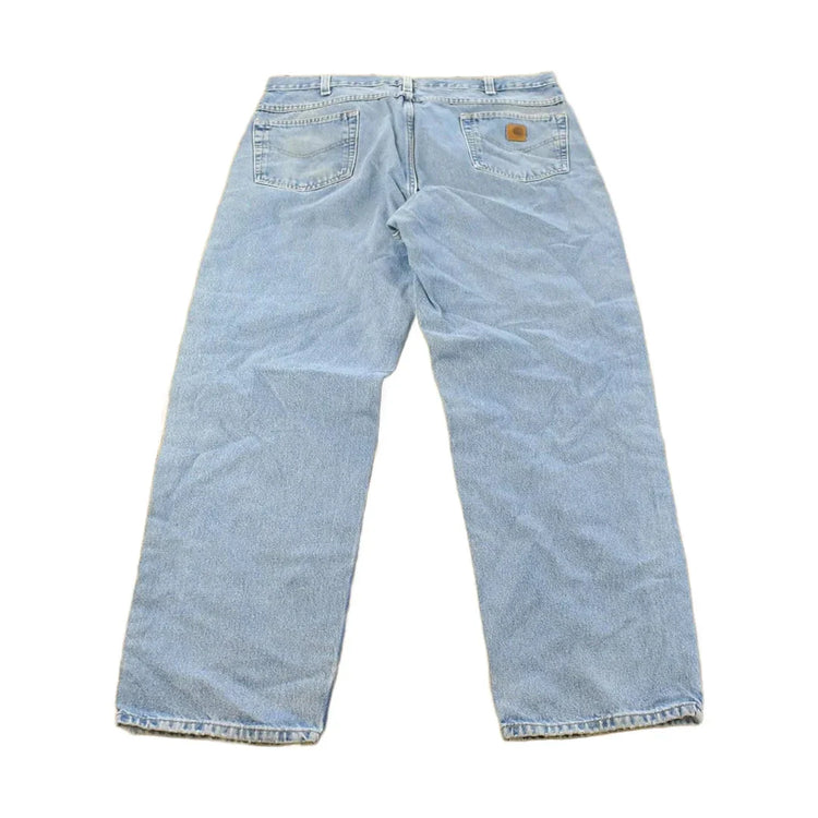Vintage 1990s Carhartt Carpenter Distressed Denim Jeans Men's 38 x 32 from propervintagecanada