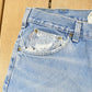 Vintage 1990s Carhartt Carpenter Distressed Denim Jeans Men's 38 x 32 from propervintagecanada