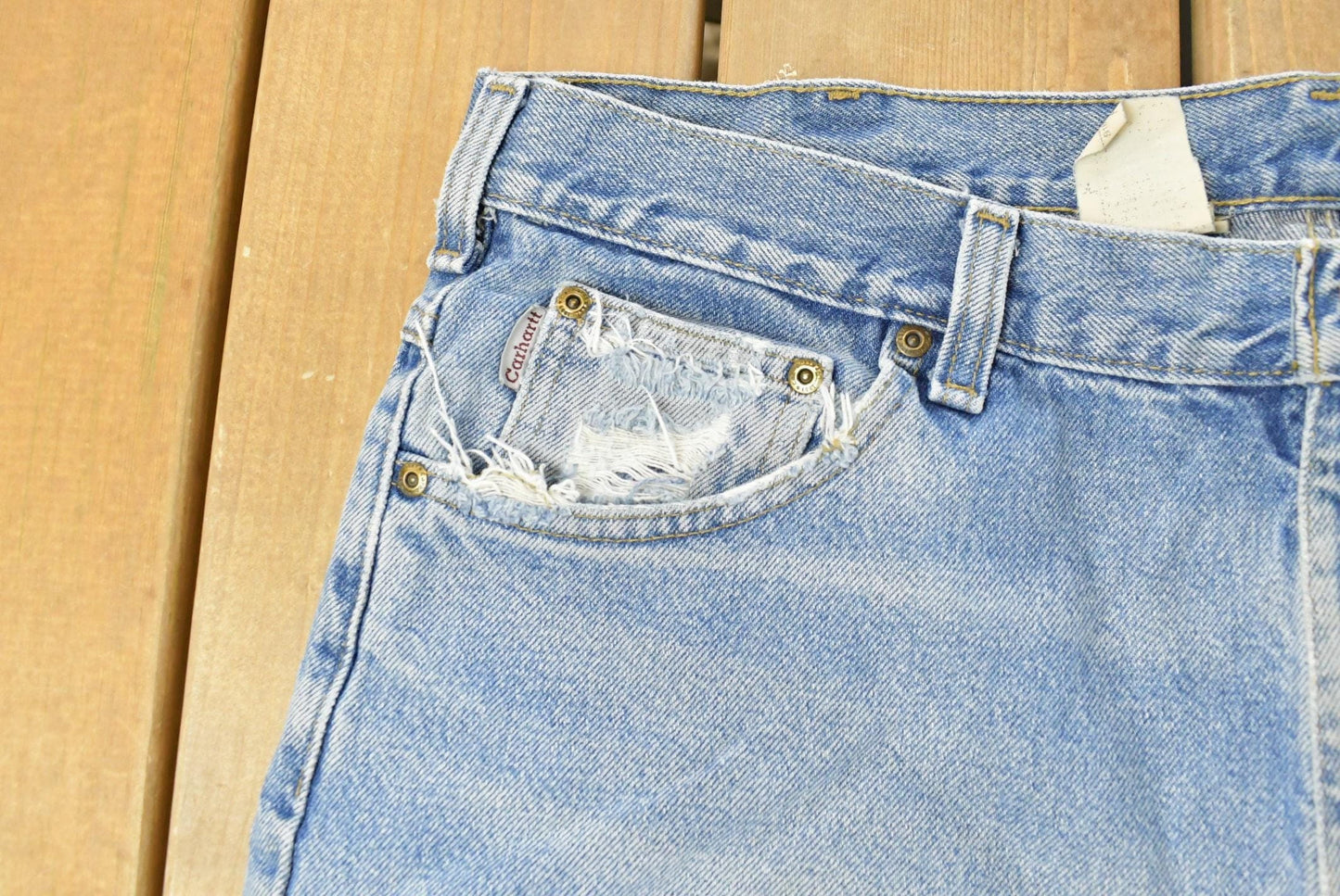 Vintage 1990s Carhartt Carpenter Distressed Denim Jeans Men's 38 x 32 from propervintagecanada