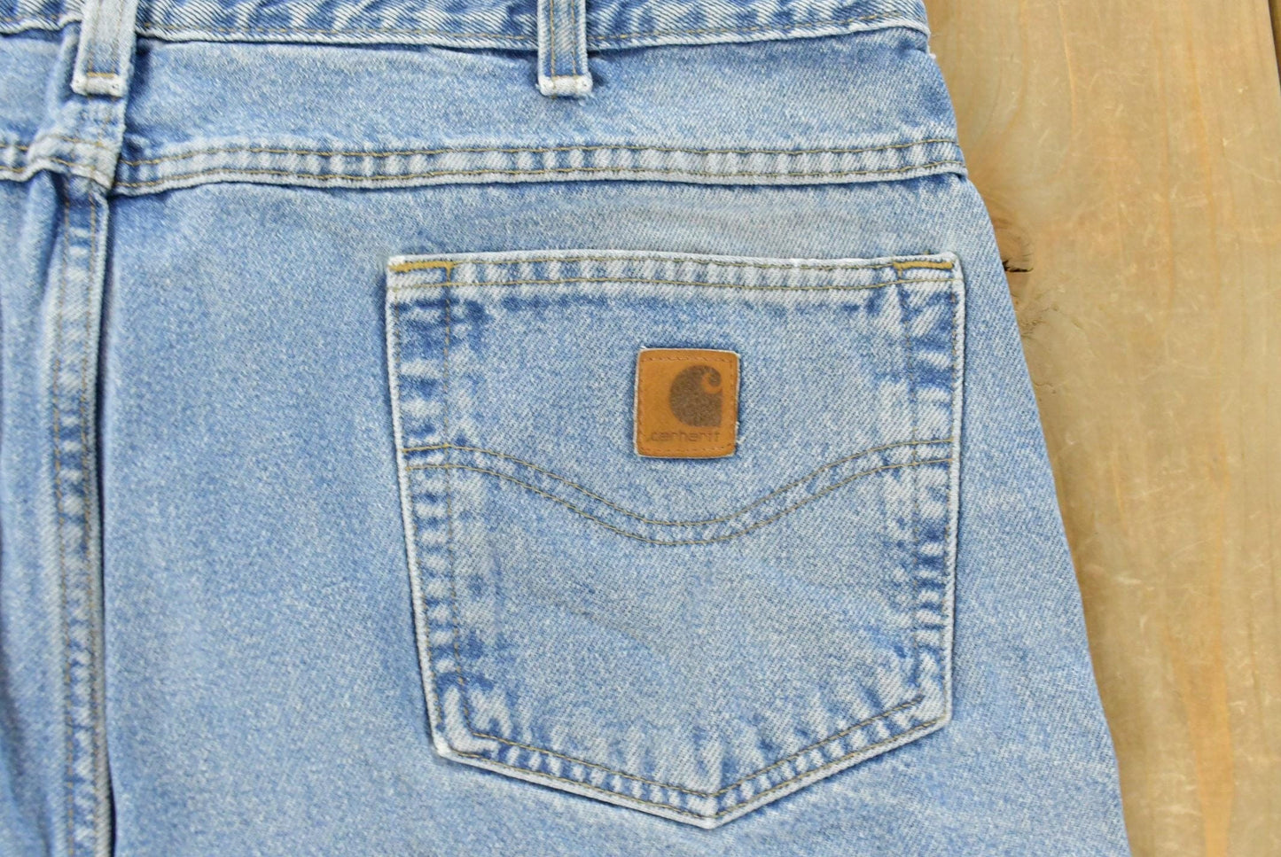 Vintage 1990s Carhartt Carpenter Distressed Denim Jeans Men's 38 x 32 from propervintagecanada