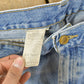 Vintage 1990s Carhartt Carpenter Distressed Denim Jeans Men's 38 x 32 from propervintagecanada