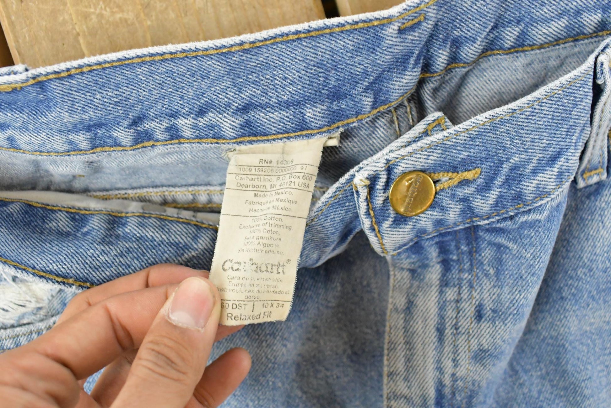 Vintage 1990s Carhartt Carpenter Distressed Denim Jeans Men's 38 x 32 from propervintagecanada