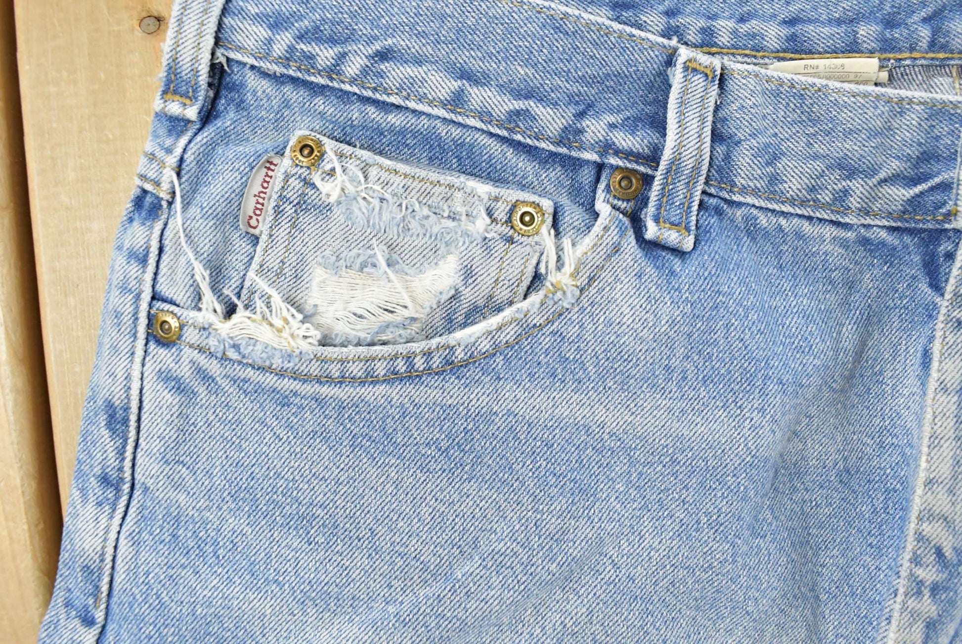 Vintage 1990s Carhartt Carpenter Distressed Denim Jeans Men's 38 x 32 from propervintagecanada