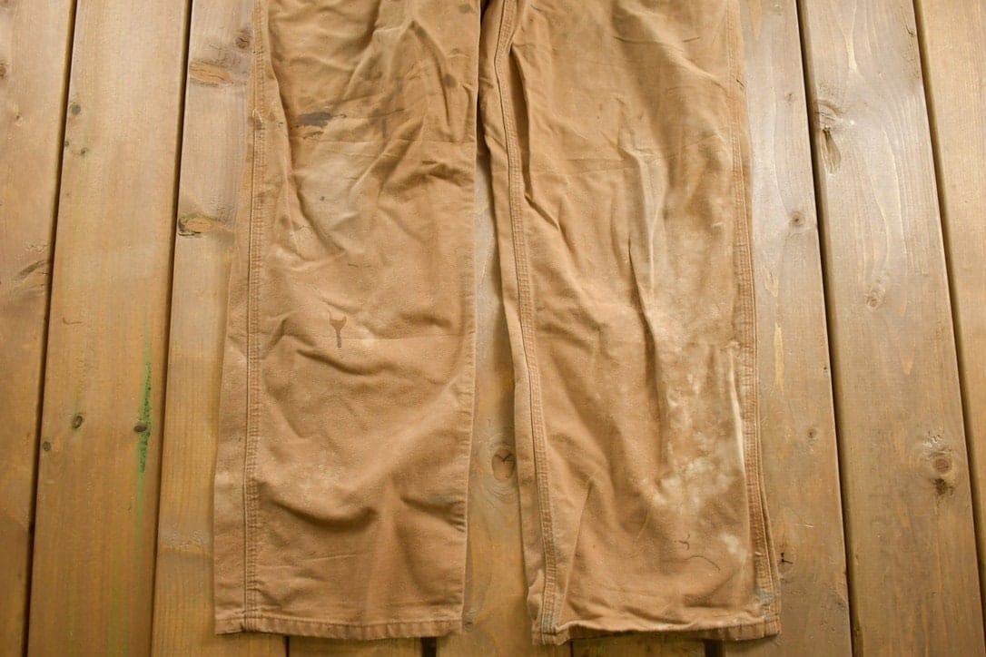 Vintage 1990s Carhartt Carpenter Pants Men's 34 x 30 from propervintagecanada