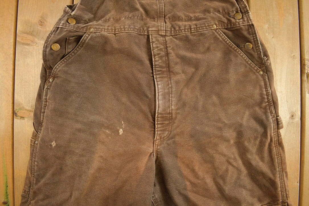 Vintage 1990s Carhartt Chocolate Brown Double Knee Canvas Overalls Men's 38 x 30 from propervintagecanada