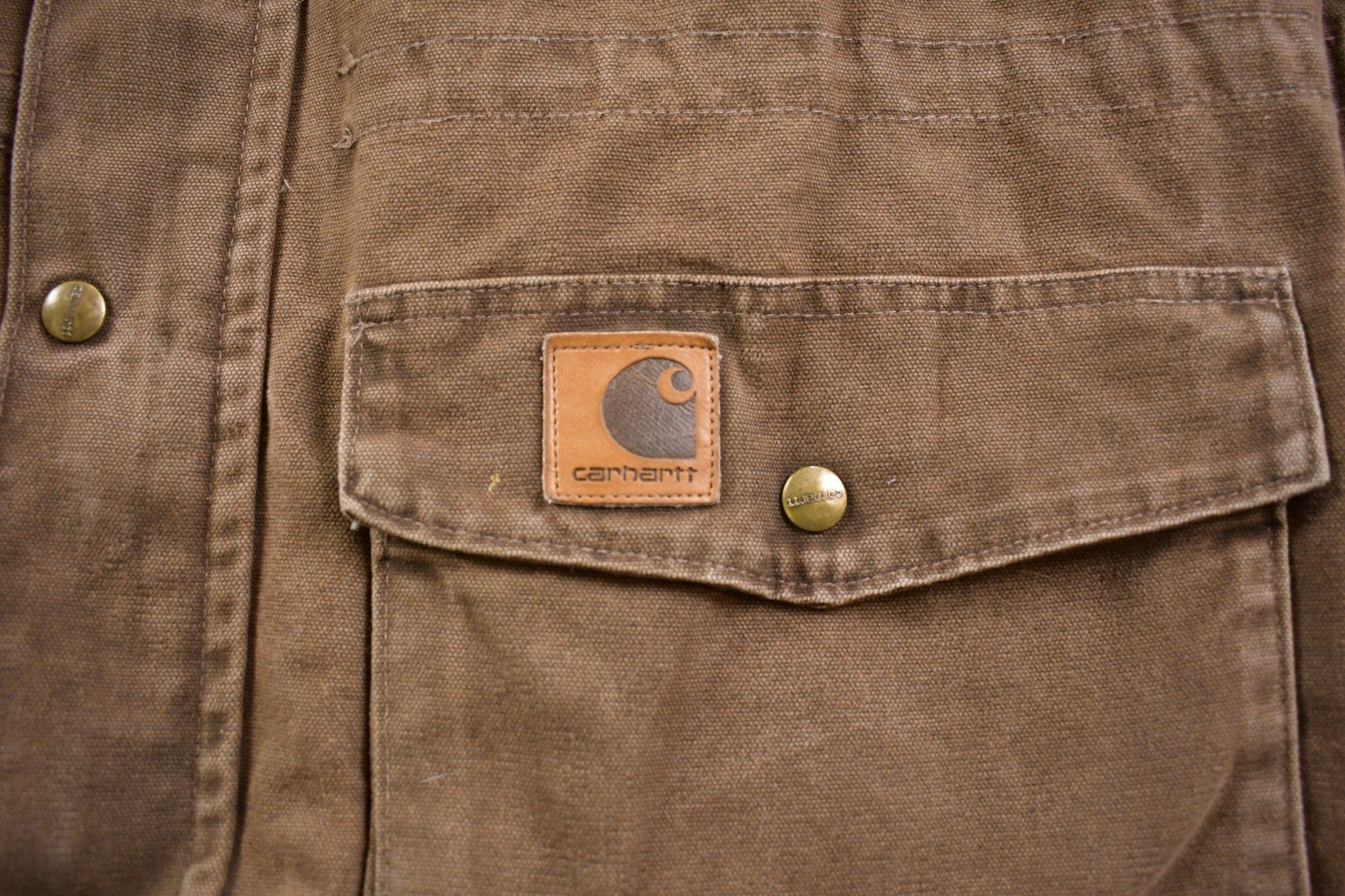 Vintage 1990s Carhartt Diomond Quilt Lined Chore Coat Men's 2XL from propervintagecanada