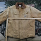 Vintage 1990s Carhartt Distressed Chore Coat Men's XL from propervintagecanada