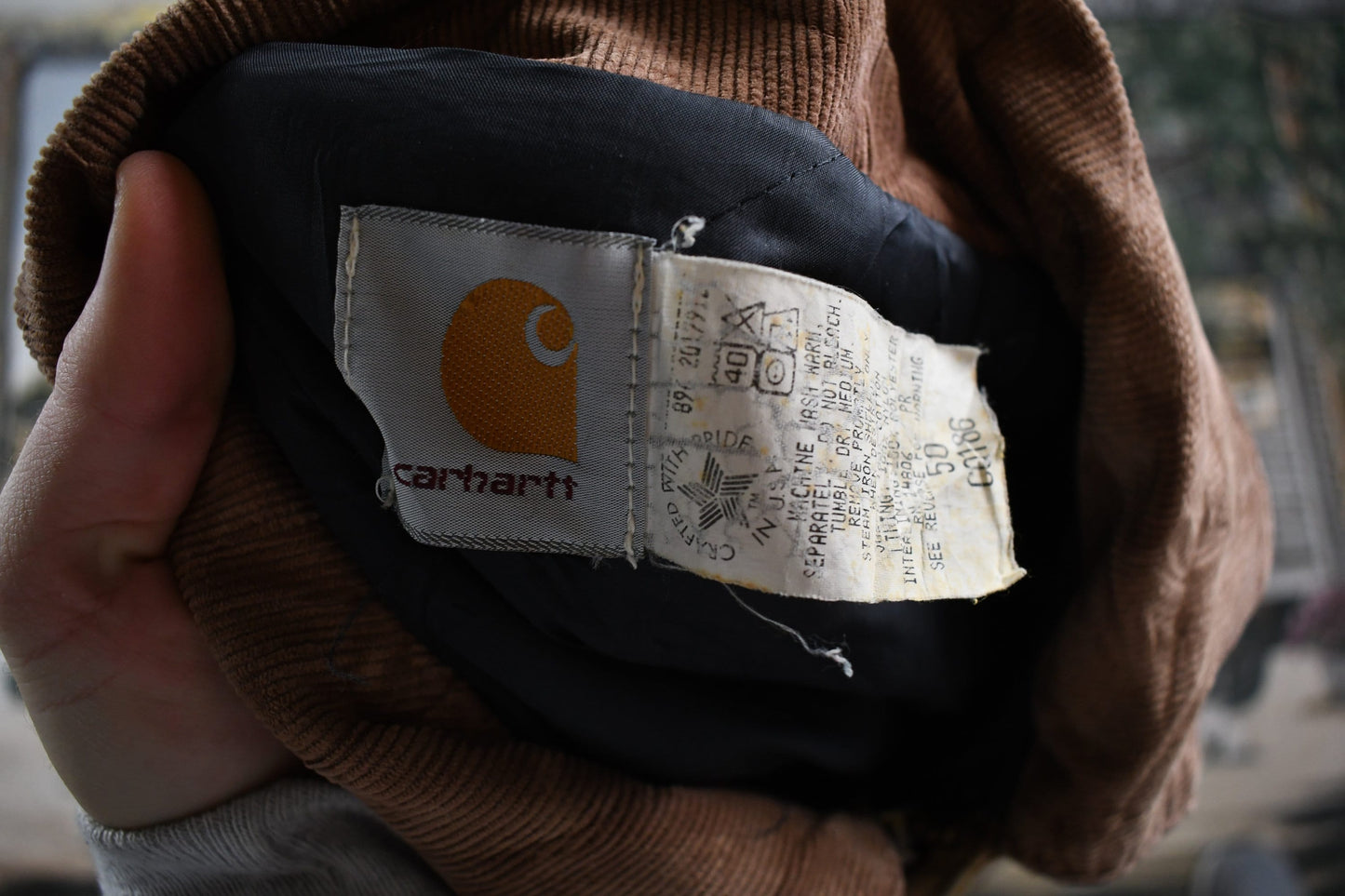 Vintage 1990s Carhartt Distressed Chore Coat Men's XL from propervintagecanada