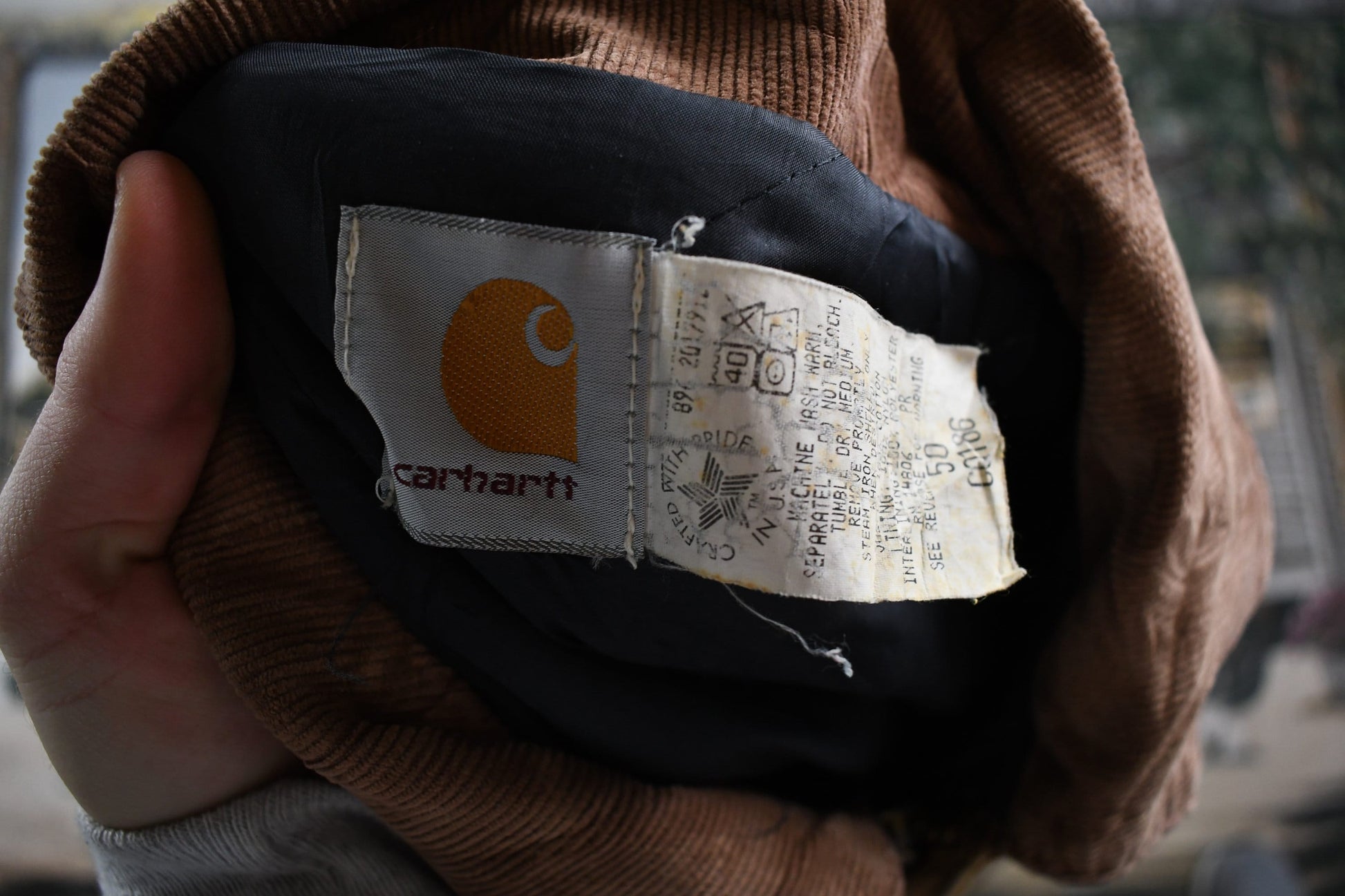 Vintage 1990s Carhartt Distressed Chore Coat Men's XL from propervintagecanada