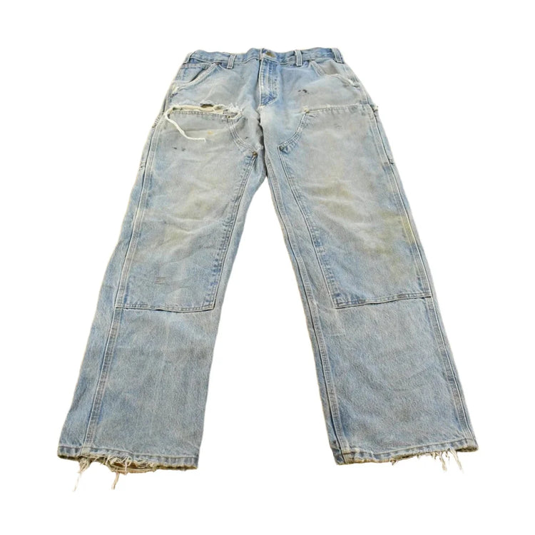 Vintage 1990s Carhartt Distressed Double Knee Denim Work Jeans Men's 31 x 33 from propervintagecanada
