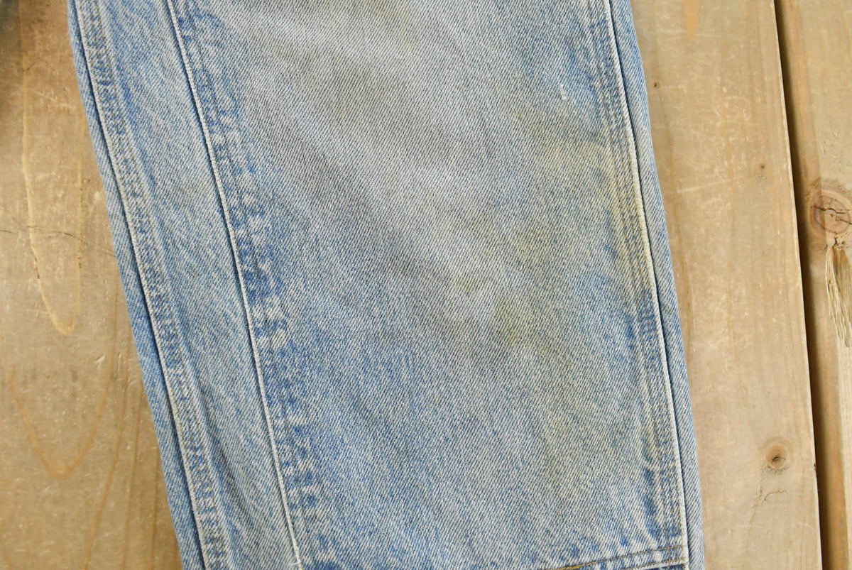Vintage 1990s Carhartt Distressed Double Knee Denim Work Jeans Men's 31 x 33 from propervintagecanada