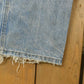 Vintage 1990s Carhartt Distressed Double Knee Denim Work Jeans Men's 31 x 33 from propervintagecanada