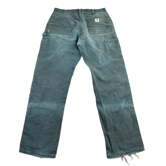 Vintage 1990s Carhartt Distressed Double Knee Denim Work Jeans Men's 32 x 31.5 from propervintagecanada