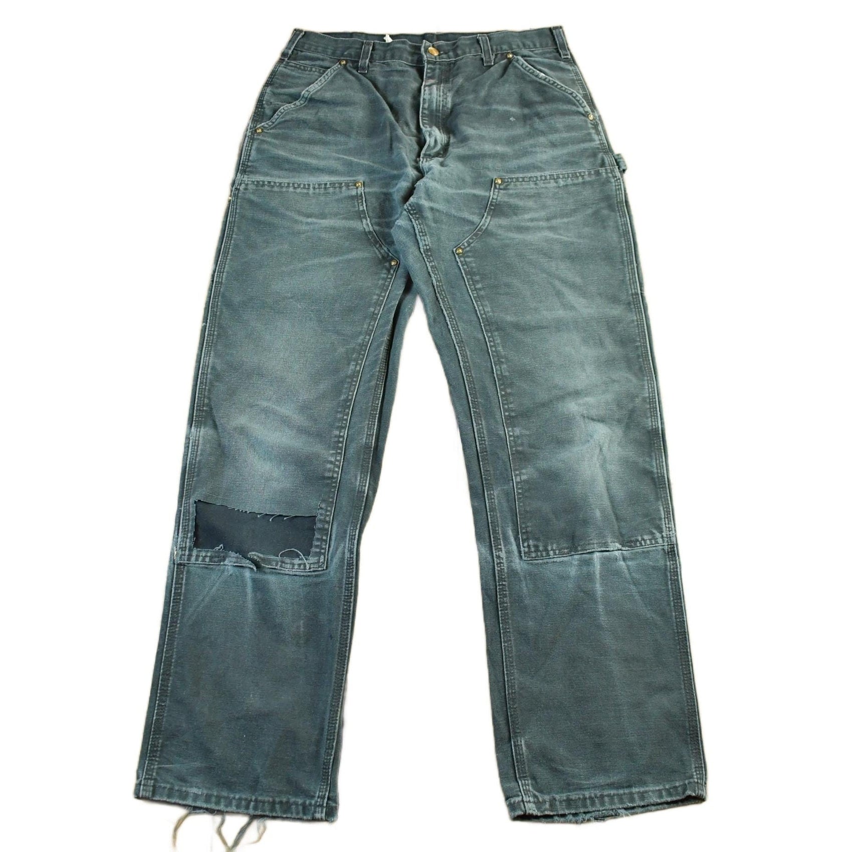 Vintage 1990s Carhartt Distressed Double Knee Denim Work Jeans Men's 32 x 31.5 from propervintagecanada