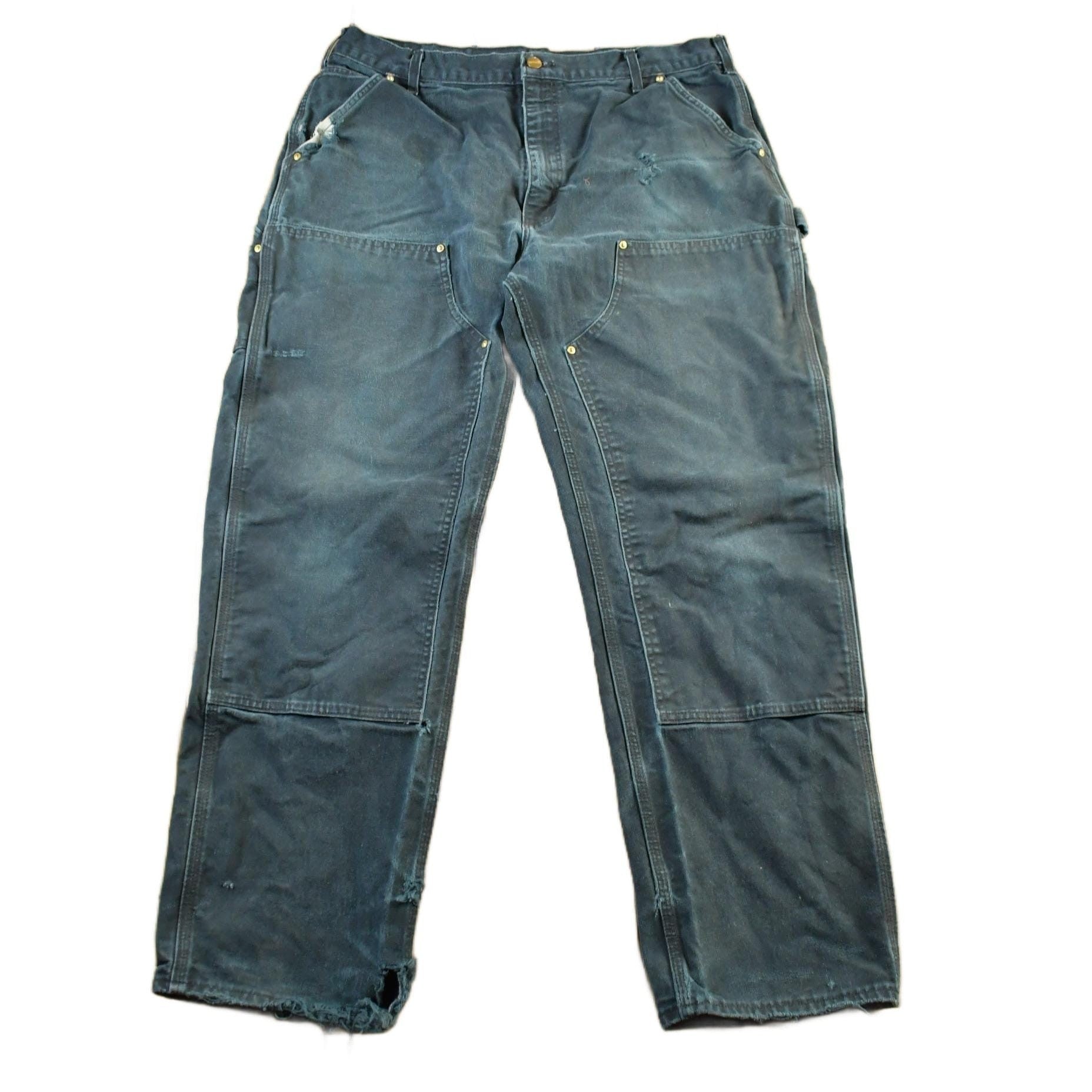 Vintage 1990s Carhartt Distressed Double Knee Denim Work Jeans Men's Large 36 x 30 from propervintagecanada