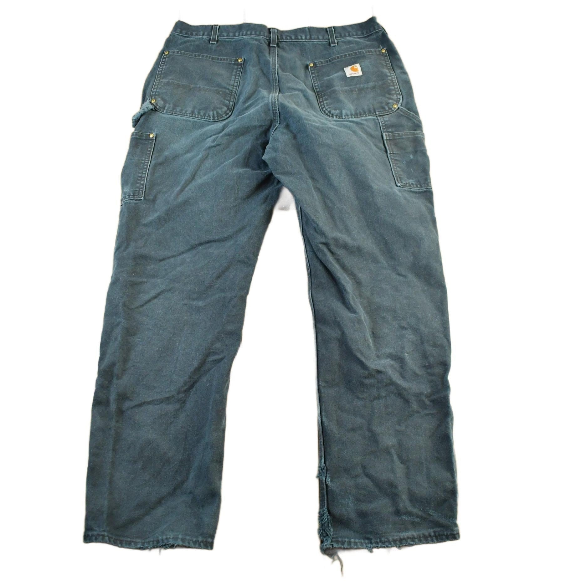 Vintage 1990s Carhartt Distressed Double Knee Denim Work Jeans Men's Large 36 x 30 from propervintagecanada