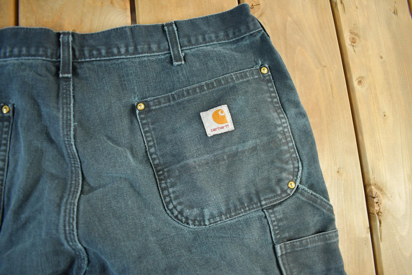 Vintage 1990s Carhartt Distressed Double Knee Denim Work Jeans Men's Large 36 x 30 from propervintagecanada