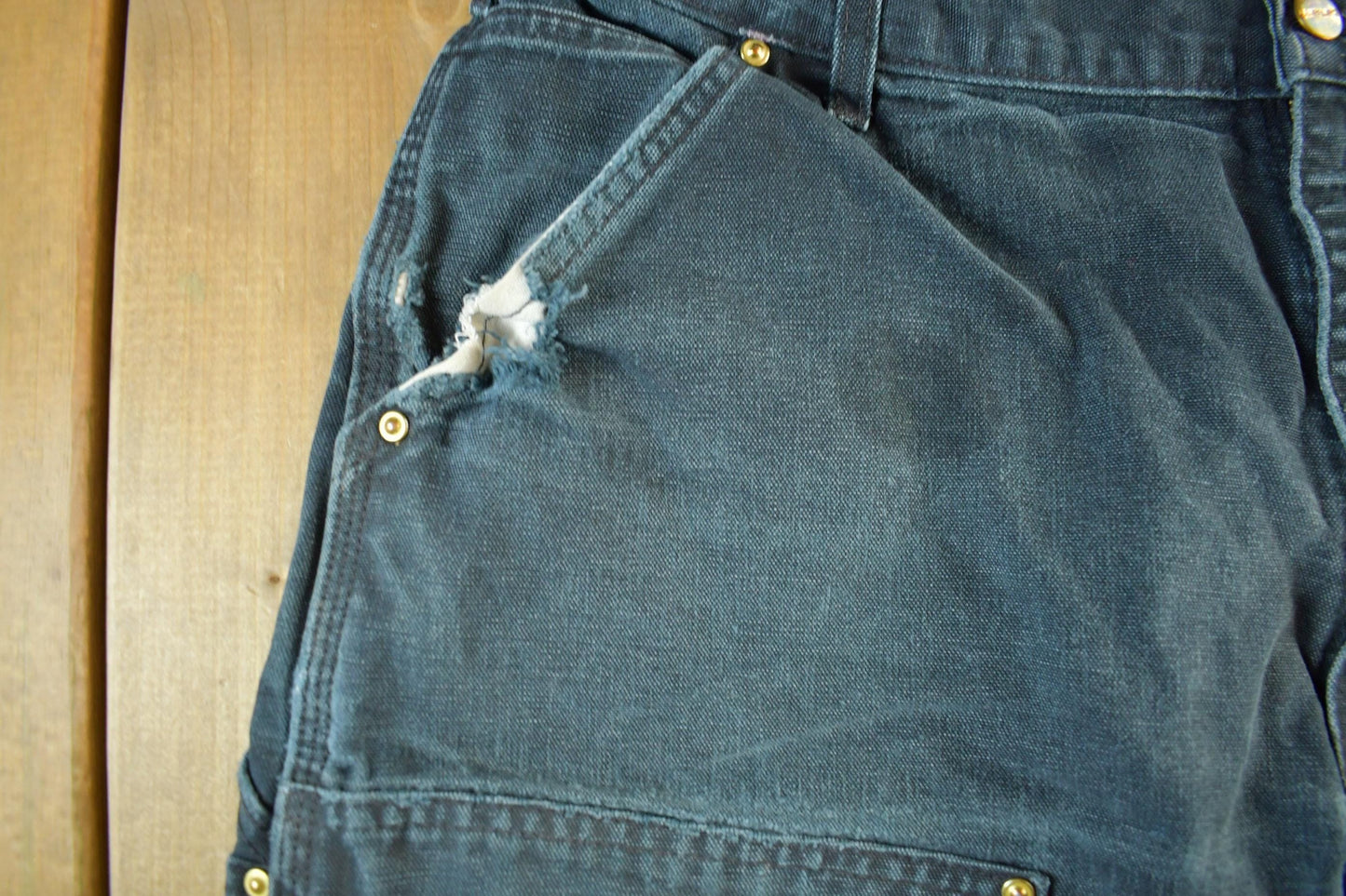 Vintage 1990s Carhartt Distressed Double Knee Denim Work Jeans Men's Large 36 x 30 from propervintagecanada