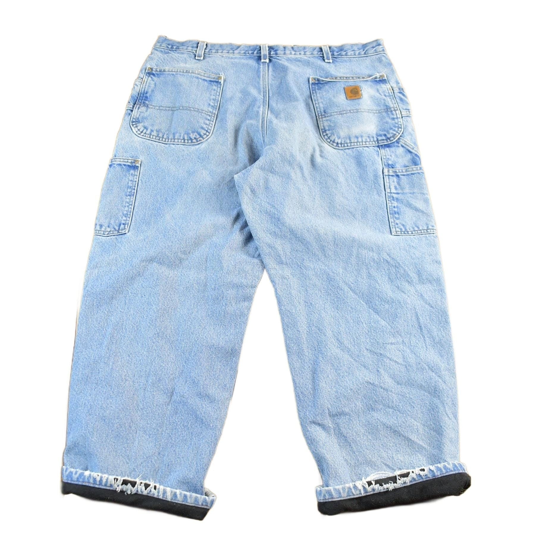 Vintage 1990s Carhartt Distressed Lined Denim Work Jeans Men's 39 x 28 from propervintagecanada