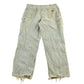 Vintage 1990s Carhartt Distressed Sun Faded Denim Work Jeans Men's 37 x 30 from propervintagecanada